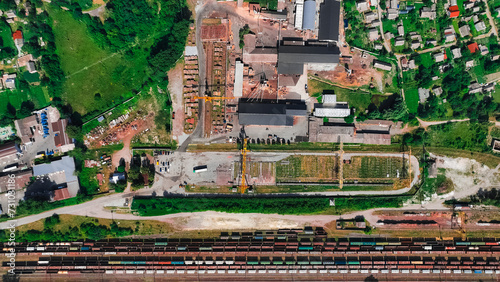 industrial cargo rail station train and wagons aerial photography from drone