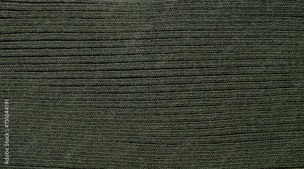 Dark green textile material background Dark green textile material background