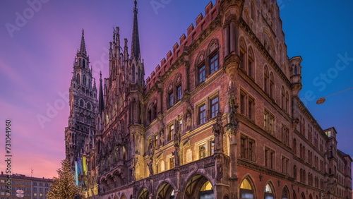 Main facade of the New Town Hall building at the northern part of Marienplatz day to night timelapse in Munich, Germany.