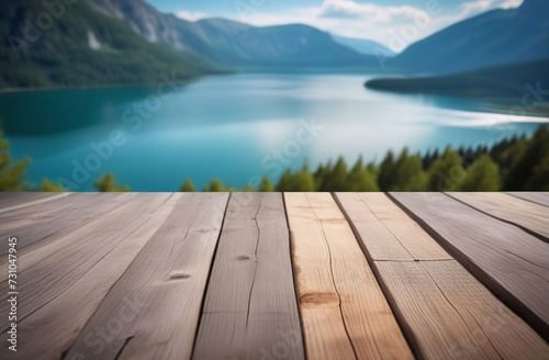 Empty wooden tabletop with blur background of summer lakes mountain. Perspective wood display on lake view. Beautiful rock glacier fresh landscape scenery, plank table blank board for product montage © Marina Demidiuk