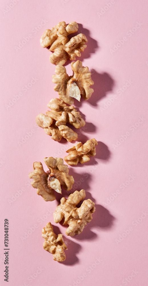 Obraz premium Walnuts kernel with hard shadows in closeup