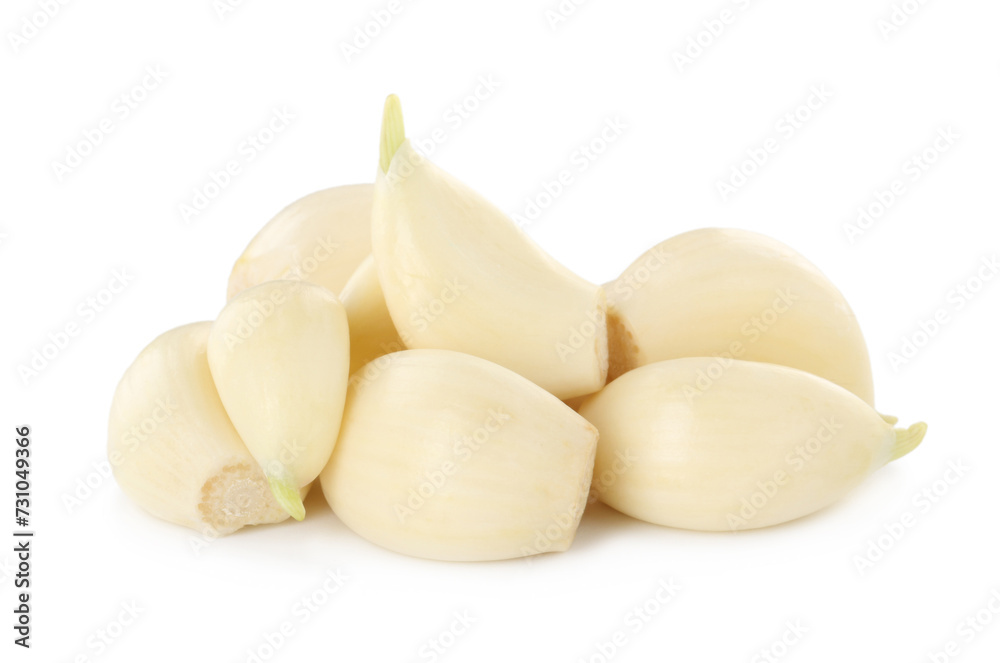 Peeled cloves of fresh garlic isolated on white Peeled cloves of fresh garlic isolated on white
