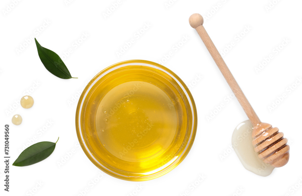 Tasty honey in bowl, dipper and green leaves on white background, flat lay Tasty honey in bowl, dipper and green leaves on white background, flat lay