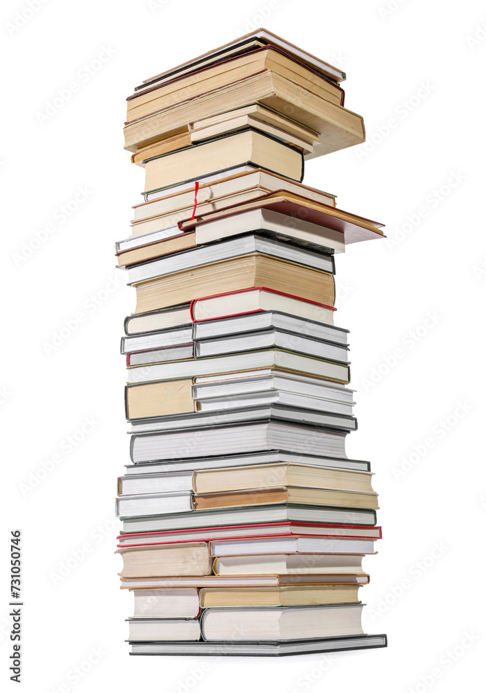 High stack of many different books isolated on white High stack of many different books isolated on white