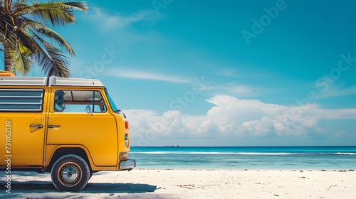 Yellow Camper surf van along tropical beach coastline. retro bus, view from side, copy space. © Almultazam