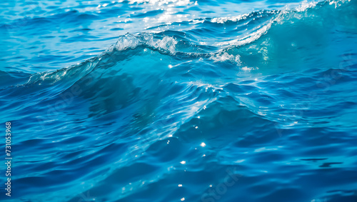 Blue wave background wallpaper, water ripples, natural drops, water splashes, beautiful realistic background of sea or ocean, nature concept.