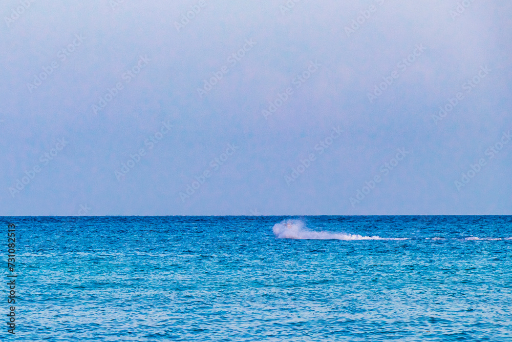 Fototapeta premium Jet ski enjoy water sports on the Caribbean beach Mexico.