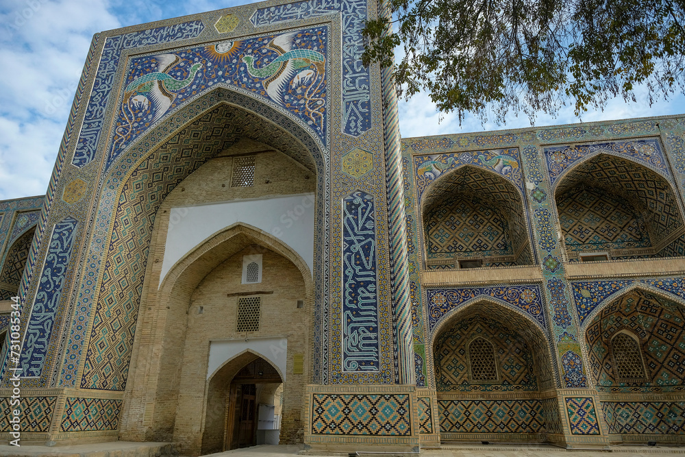 Views of the Nodir Devonbegi Madrasah in the center of Bukhara in Uzbekistan.