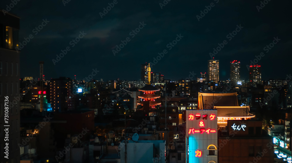 TOKYO, JAPAN - OCT 17,2018 : Cityscape on the rooftop view at night. TOKYO, JAPAN - OCT 17,2018 : Cityscape on the rooftop view at night.