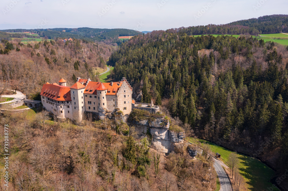 Aerial view of Rabenstein Castle in Franconian Switzerland - Germany in the Ahorn Valley in spring