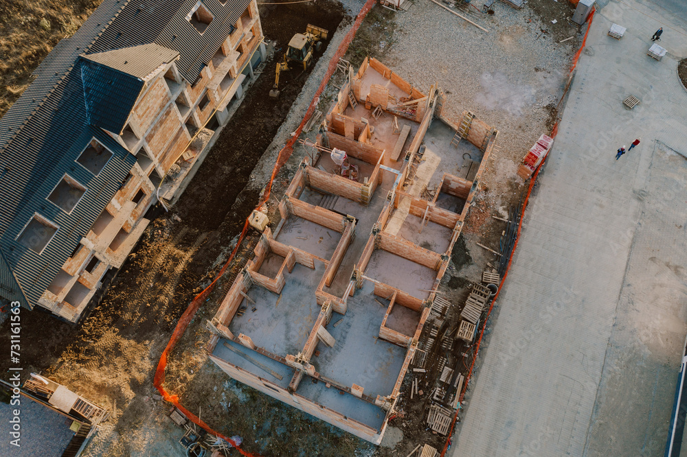 Aerial view of a new development area. Construction site. Cement and bricks structures