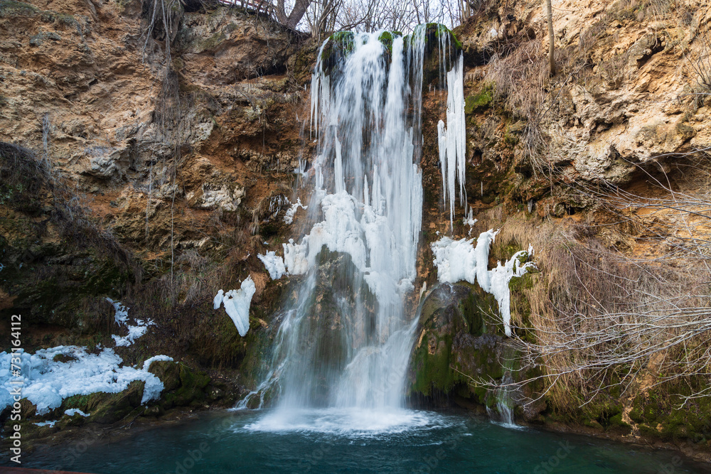Frozen waterfall Lisine or Veliki Buk in Resava court in winter, Despotovac city, Serbia
