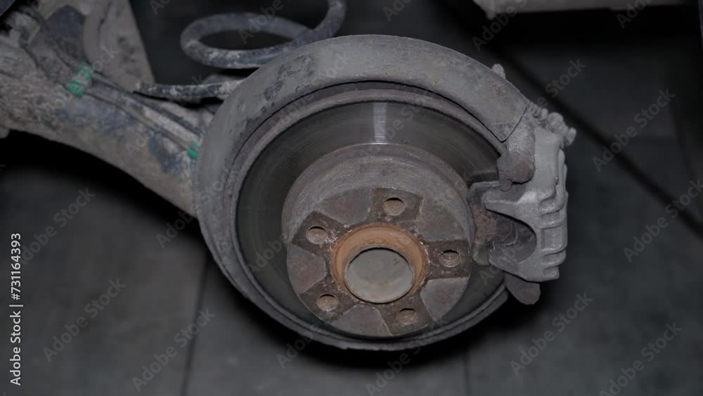 Replacement of outdated parts of the front hub in the chassis of a car in a car service center