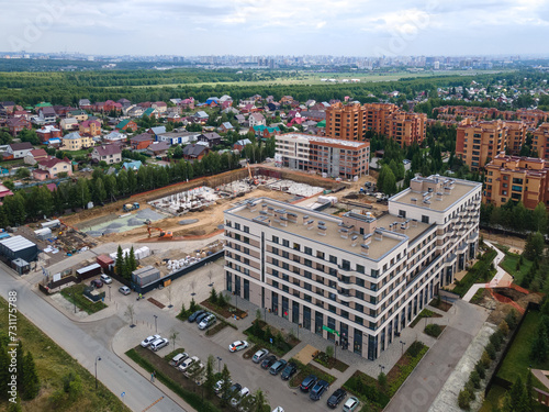 Photography the construction site of an apartment building in the summer from a height