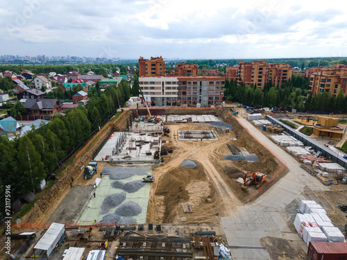 Photography the construction site of an apartment building in the summer from a height