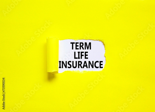 Term life insurance symbol. Concept words Term life insurance on beautiful white paper. Beautiful yellow paper background. Medical term life insurance concept. Copy space. photo