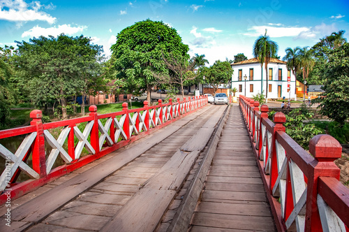 Bridge over Almas River Almas River in Pirenopolis. It is a town known for its waterfalls and Portuguese colonial architecture, founded in 1727 by colonizers who came for the gold rush. GO, BR, 2016 photo