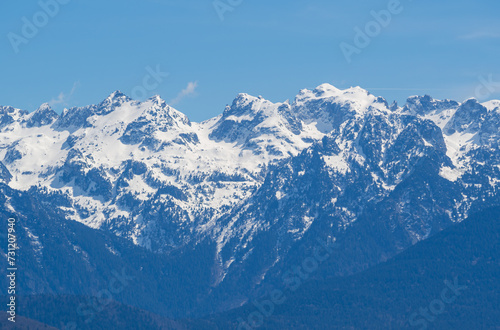 Blue morning sky over the French Alps mountains, Alpe d'Huez, France photo