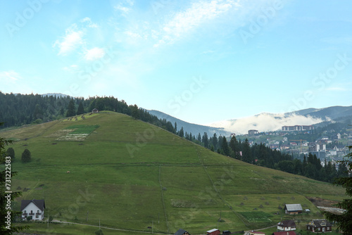 View of meadow and village ...