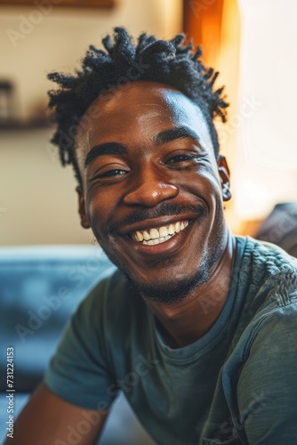 Cheerful African American Man Radiating Happiness in Sunlit Living Room Portrait