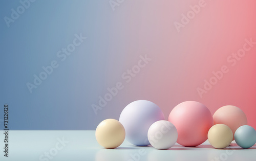 small and large balls of delicate shades on a pink-blue background. a place for text or advertising.