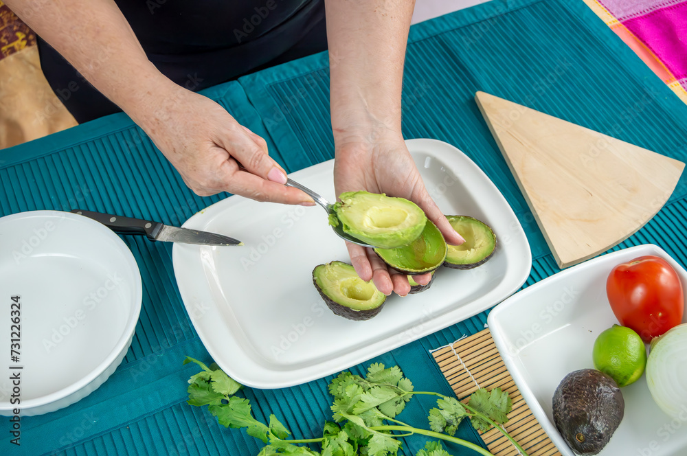 Hands Crafting Guacamole with Ripe Avocados. A series of images showcasing hands meticulously transforming avocados into a creamy delight preparing the guacamole Hands Crafting Guacamole with Ripe Avocados. A series of images showcasing hands meticulously transforming avocados into a creamy delight preparing the guacamole