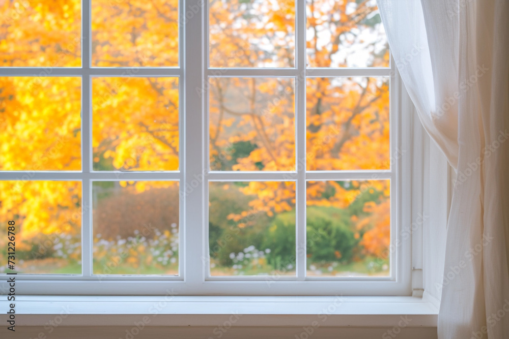 Naklejka premium White tall window sill with autumn garden on background
