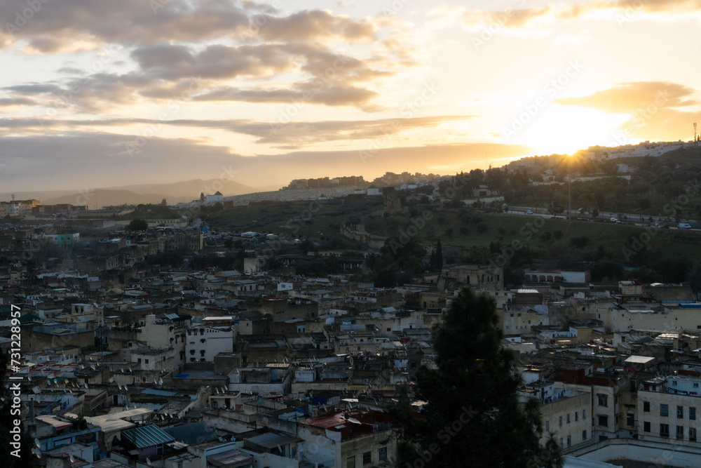 view of the sunrise on a rooftop of Fes