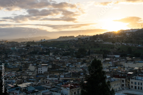 view of the sunrise on a rooftop of Fes