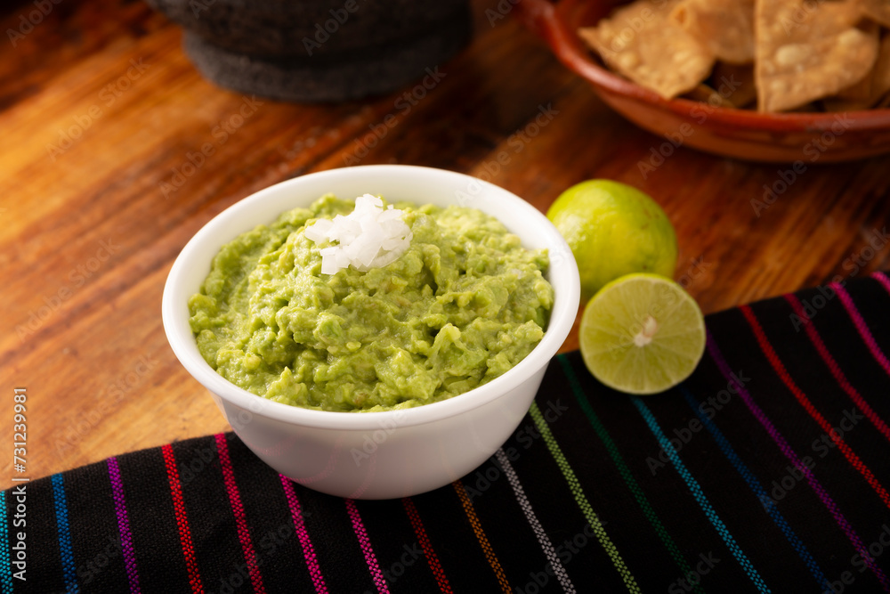 Guacamole. Avocado dip sauce, one of its many ways of consuming it is spread on tortilla chips also called Nachos. Mexican easy homemade sauce recipe very popular. Guacamole. Avocado dip sauce, one of its many ways of consuming it is spread on tortilla chips also called Nachos. Mexican easy homemade sauce recipe very popular.