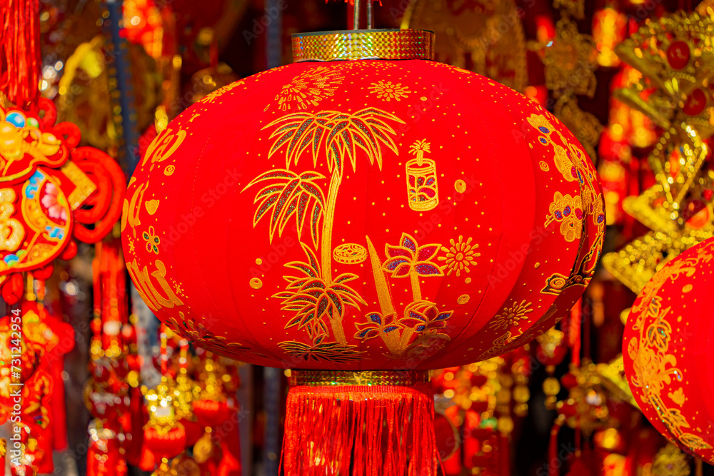 Naklejka premium The fair before the Lunar New Year. The Eastern New Year according to the lunar calendar. Sale of attributes and jewelry in Nha Trang in Vietnam.