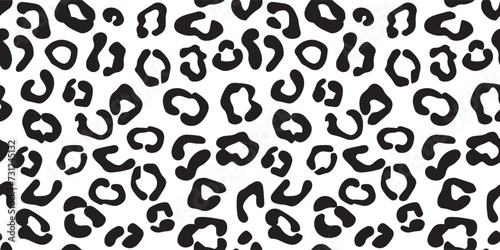 Seamless leopard pattern, black spots on white background, classic design in EPS 10.