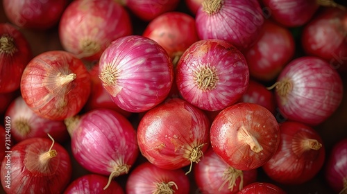Pile of fresh red onion or shallot. Close up view.