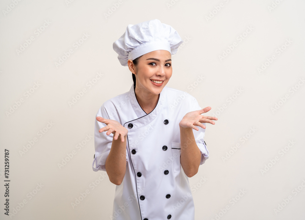 Smiling Young beautiful asian woman chef in uniform casual posing on isolated background. Cooking woman Occupation chef or baker People in kitchen restaurant and hotel. Smiling Young beautiful asian woman chef in uniform casual posing on isolated background. Cooking woman Occupation chef or baker People in kitchen restaurant and hotel.