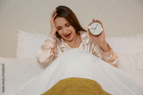 Stressed young woman with a...