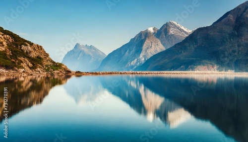 mirrored mountain seascape surreal abstract landscape wallpaper © Ashley