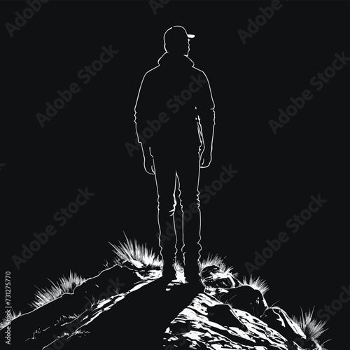 Silhouette of a person standing on a rocky hilltop against a stark black background, exuding a sense of solitude and adventure.