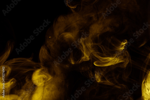 Yellow steam on a black background.