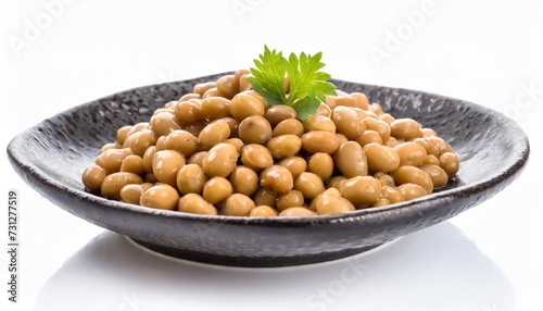natto beans in a dish isolated on white background