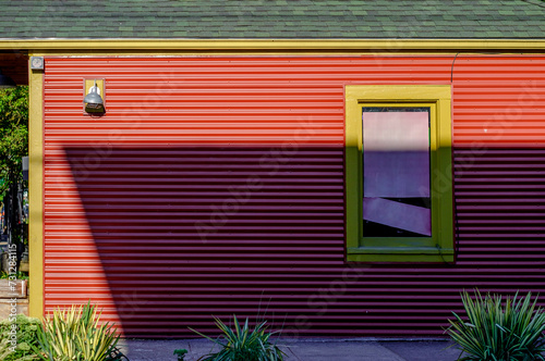 Red slate house with empty sign