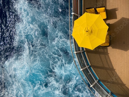 Yellow umbrella on a cruise ship 