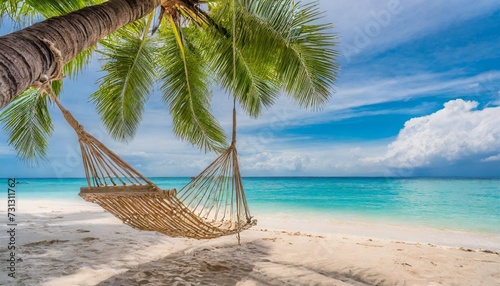 tropical beach background as summer landscape with beach swing or hammock and white sand and calm sea for beach banner perfect beach scene vacation and summer holiday concept boost up color process