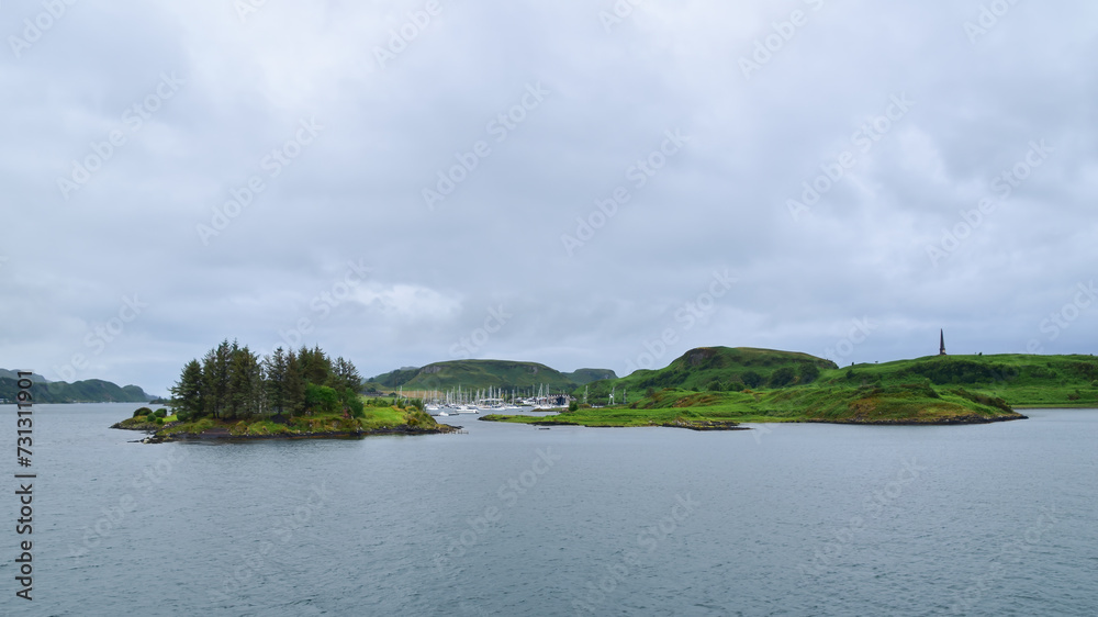 Moored boats in ocean hamlet, Inner Hebrides islands, Scotland seascape,  United Kingdom, travel Europe