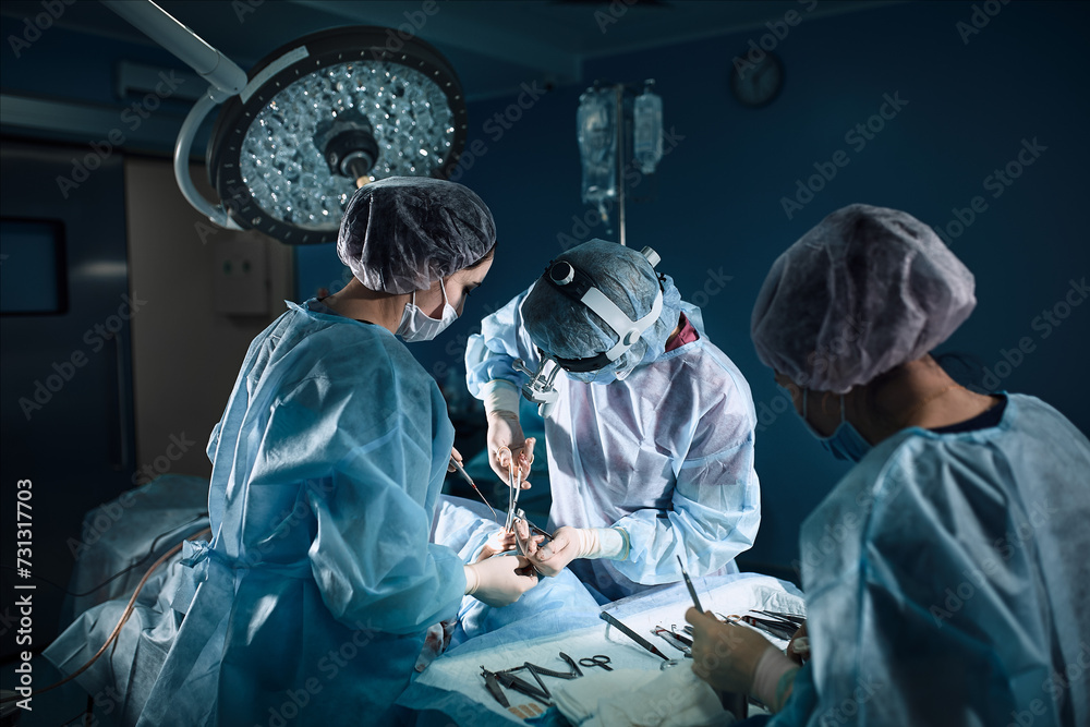 Φωτογραφία A shot of an emergency and a serious accident in the operating room, a team of surgeons makes an emergency operation to people in an accident
