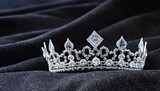 diamond silver crown for miss pageant beauty queen contest crystal tiara jewelry decorated gems stone and abstract dark background on black velvet fabric cloth macro photography copy space