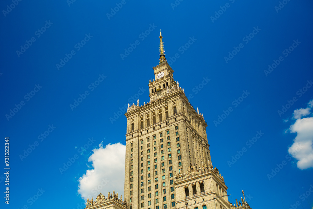 Historic Palace of Culture and Science tower in Warsaw under clear blue sky Historic Palace of Culture and Science tower in Warsaw under clear blue sky