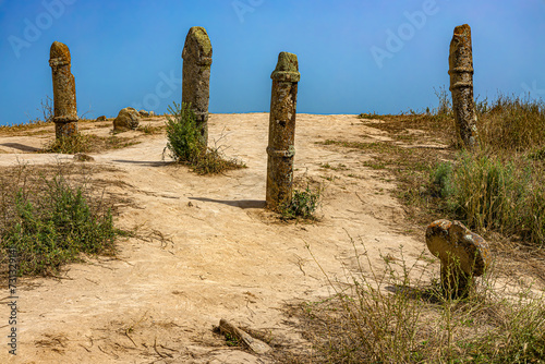 Obraz na płótnie Iran, Golestan province (near the border with Turkmenistan). Khalid Nabi Cementary dating back probably to Palaeolithic era, is famous for the specific shape of gravestones w salonie