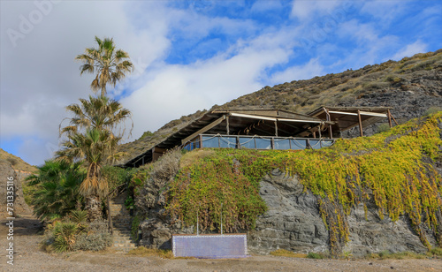 View upwards to a bar on the seashore