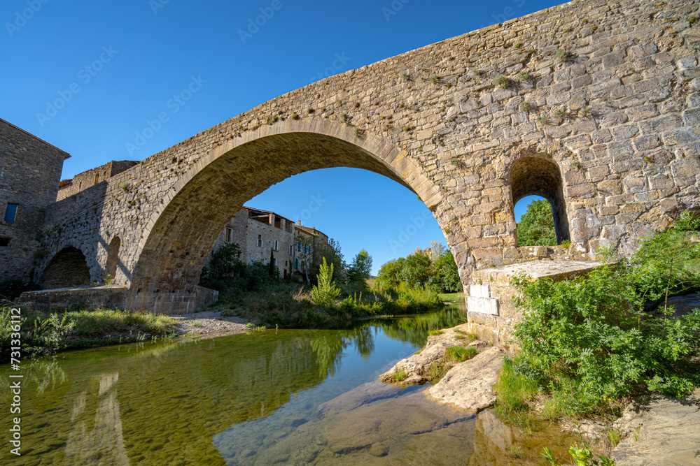 The old bridge of a Southern France village