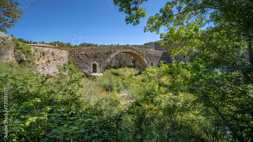 The old bridge of a Southern France village